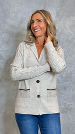 CARDIGAN CON TRECCE